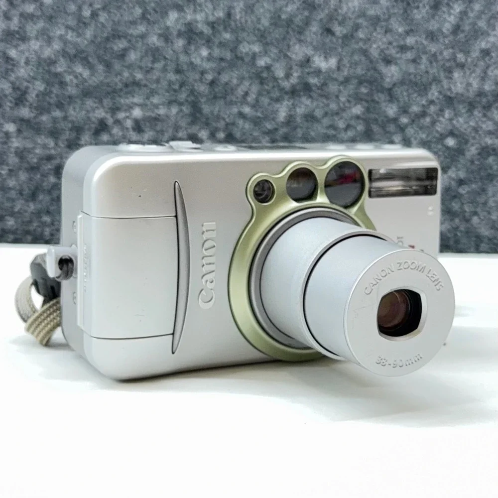 Canon Sure Shot 90u Date 35mm Film Camera 38-90mm Zoom Lens Silver with Case